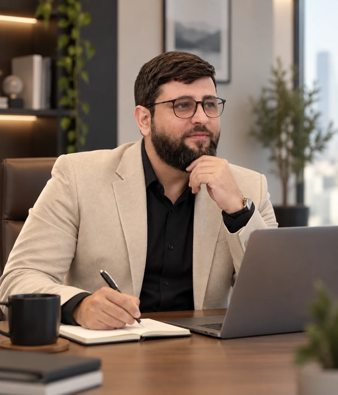 Muhammad Ali Abbasi working at his desk